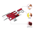 Red multitool with knife, scissors, and magnifying glass on a white background
